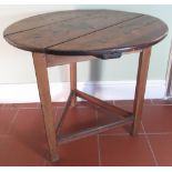 C19th pine cricket table, planked circular top on three triangular supports joined by a plain