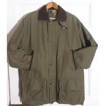 Le Chameau green proofed cotton shooting jacket with brown suede collar, hand warmer pockets and fly