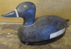 C20th decoy duck, painted black and white plumage and black tipped grey beak, with string
