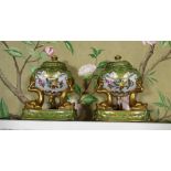 Pair of Coalport style cassolettes, decorated with flowers in reserve panels on green and gilt