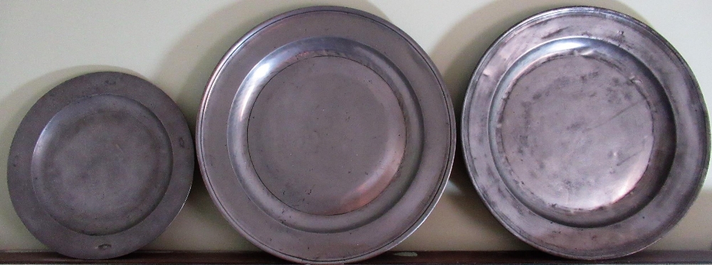 Large C18th pewter charger, stamped crowned X and other marks, another with indistinct marks and