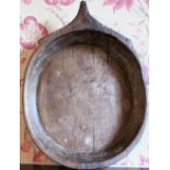 C19th hand carved oval treen bowl with triangular handle, W37cm L49cm