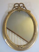 Regency style gilt wood and gesso wall mirror, oval plate in rope twist surround with tasseled