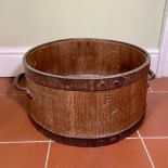 Victorian coopered oak bushel measure with iron bands and handles, stamped Crown VR, Bushel, D56cm