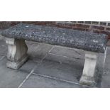 Regency style composition garden bench seat with flat top on scrolled end supports with