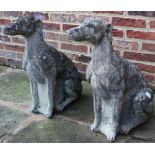 Pair of weathered composite models of seated hounds, H56cm (2)
