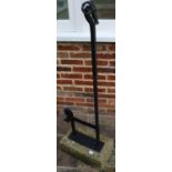 Yorkshire craftsman made wrought iron boot scraper with rams head terminal on rectangular plinth,