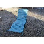 Large steel framed wooden slatted garden reclining chair with arms