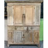 Victorian pine housekeepers type cupboard with moulded cornice above pair of panelled doors with