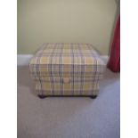 Box stool of square waisted form, with hinged padded lid, upholstered in yellow check, on bun turned