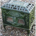 Faunus cast iron stove with ornate floral and swag design