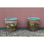 Pair of C20th Chinese pottery jardiniere decorated with four claw dragons, D43cm H44cm (2)
