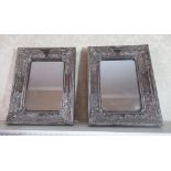 Pair of C20th silver plated rectangular photo frames, rectangular with relief scroll and cartouche