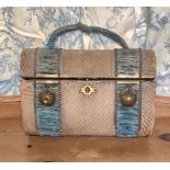 French basket weave dome topped jewellery box with two blue silk bands with brass bosses, ribbon