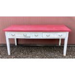 C20th pine rectangular kitchen table, later Formica top above two long and one short frieze