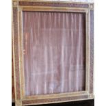 C20th gilt and tooled leather easel photograph frame H45cm x W37cm