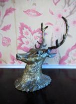 Edwardian brass ink stand in the form of a stags head, hinged with glass eyes, H15cm