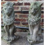 Pair of weathered composite stone models of seated Heraldic lions, H55cm (2)