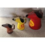 Red metal Shell oil pourer, yellow metal Shell quart oil pourer, Esso oil pourer, max H31cm (3)