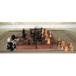 Turned box wood and ebonised chess set, King H7.25cm, in a mahogany and beech folding chess board