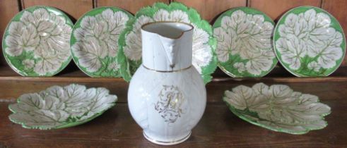 Worcester style leaf moulded jug, with mask handle, decorated with initials PL in gilt, H23cm, and a