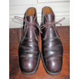Pair of R.M.Williams dark brown leather lace up boots, with rubber soles, no size given probably