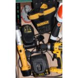 Collection of tools including Stihl battery powered hand hedge clipper, Dewalt screwdriver, Dewalt