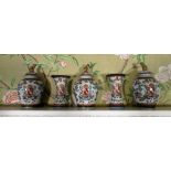 Samson style Garniture de Cheminee comprising three Armorial decorated ginger jars, the covers