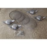 Set of four Morgan chrome metal two ear wheel spinners and a set of four chromed metal head lamp