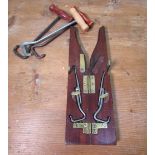 Pair of C20th steel folding boot pulls, in a mahogany folding case, pulls L8cm, overall L31cm and