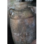 Terracotta olive jar barrel with circular tapering body and two neck handles, H86cm