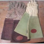 Two pairs of Bradley's leather and suede gauntlets (4)