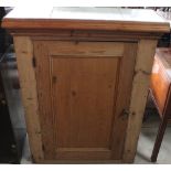 Victorian waxed pine cupboard with shelved interior enclosed by single panel door with later added