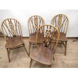 Set of four Ercol style elm and beech wheel and stick back kitchen chairs