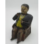 Tammany cast iron money box, painted and modelled as the seated 19th Century U.S politician