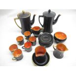 W & R Carlton Ware matte black and orange lustre part coffee services