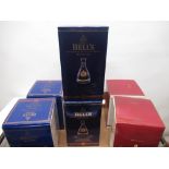 Four Bells Whisky Christmas decanters and two ER.II 50 year anniversary decanters, all complete with