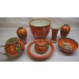 W & R Carlton Ware orange lustre ware jardinière decorated with exotic birds and flowers, applied