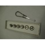 Boxed set of six Guinness waste coat buttons, silver plated button hook