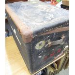 Mid C20th steel bound cabin trunk, bearing traces of multiple shipping labels, W69cm H55cm D51cm