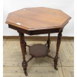 Late Victorian mahogany centre table with octagonal moulded top, turned tapering legs with octagonal