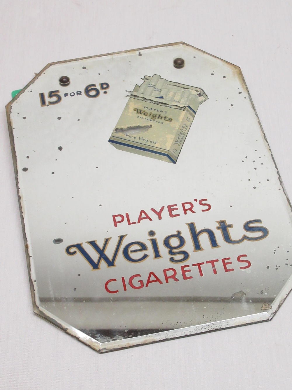 Early C20th Player's Weights Cigarettes, beveled edged advertising mirror with canted corners 25.5cm