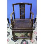 Early to mid 20th C Chinese hardwood armchair with solid seat and carved back panel