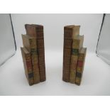 Two bookends modelled as three leather bound books