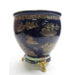 W & R Carlton Ware navy blue ground chinoiserie decorated Kang Hsi jardinière on matching stand