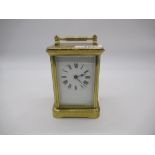 C20th brass cased carriage timepiece