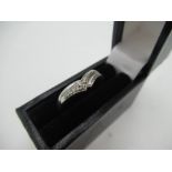 9ct white gold ring with faux stacked wishbone ring shank inset with ten round cut diamonds, Size P,