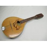 Mid C20th bowl back 17 fret Mandolin with inlaid foliage detail around the sound hole, made in