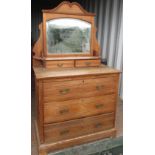 Edwardian ash dressing chest with arched mirror above two frieze drawers and three long drawers,