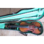 Cased violin and two bows (A/F) with accessories and one piece back